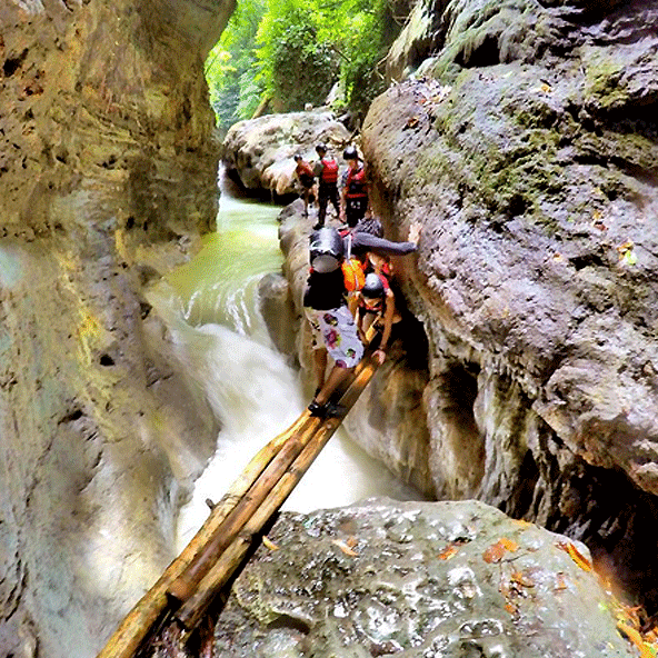 Cliff jumping during canyoneering