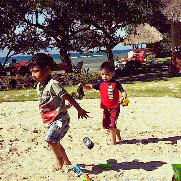 Kids enjoying the beach at Hale Manna
